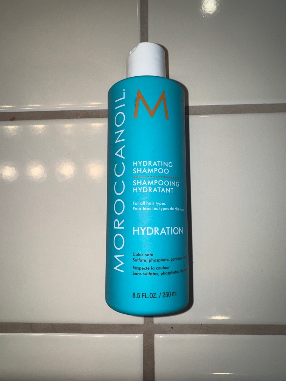 Moroccanoil Hydration Shampoo - Bright Turquoise Bottle with Orange Logo
